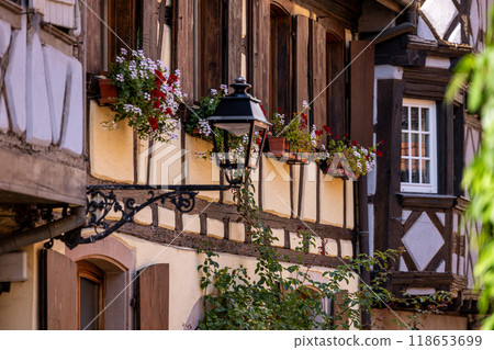 Old half-timbered houses in the historic medieval old town of Eguisheim in Alsace and on Alsace Wine Route, Haut-Rhin, Grand Est, France, Europe 118653699