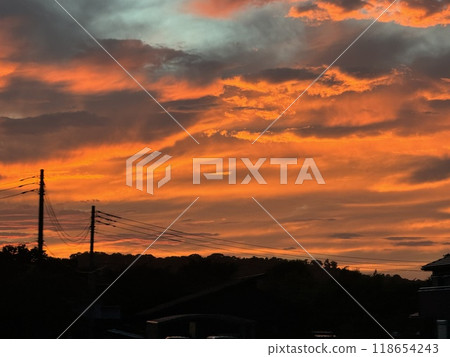 Bright sunset clouds 118654243