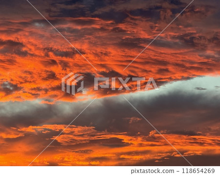 Eerie, bright red sunset clouds Eerie, bright red sunset clouds 118654269