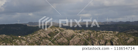 Anorthosite rock formations and windmills, Egersund, Norway. 118654714
