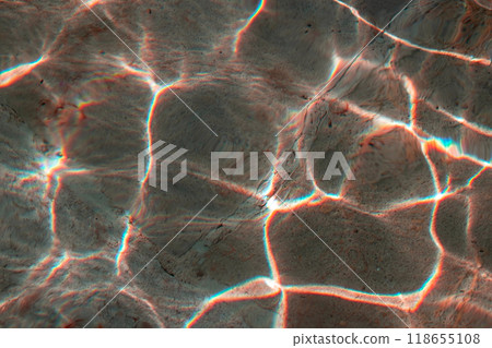 Sun glare on the water in the fountain with an old stone floor, unusual abstract texture Sun glare on the water in the fountain with an old stone floor, unusual abstract texture 118655108
