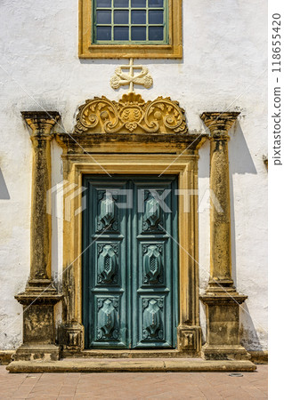Entrance of baroque church with wooden door Entrance of baroque church with wooden door 118655420