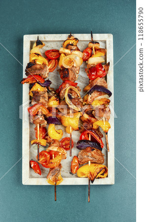 Set of delicious grilled kebabs on skewers. Set of delicious grilled kebabs on skewers. 118655790