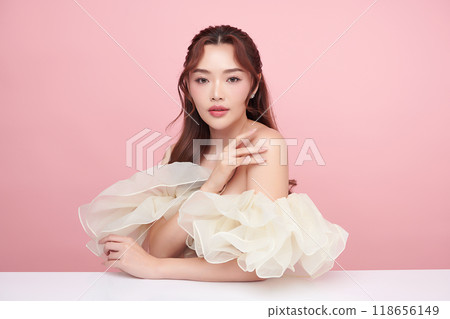 Beautiful young asian woman with clean fresh skin on pink background, Face care, Facial treatment, Cosmetology, beauty and spa, Asian women portrait. Beautiful young asian woman with clean fresh skin on pink background, Face care, Facial treatment, Cosmetology, beauty and spa, Asian women portrait. 118656149