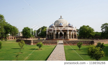The tomb of Isa Khan is decorated with a veranda supported by multiple pillars, featuring canopies, tiles, and latticed windows. [Delhi, India] 118656266