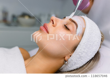 facial rejuvenation treatment with cream at the spa facial rejuvenation treatment with cream at the spa 118657046
