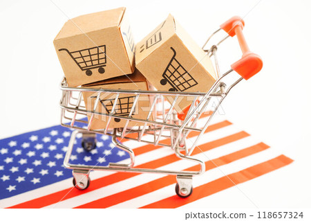 Online shopping, Shopping cart box on US America flag, import export, finance commerce. Online shopping, Shopping cart box on US America flag, import export, finance commerce. 118657324