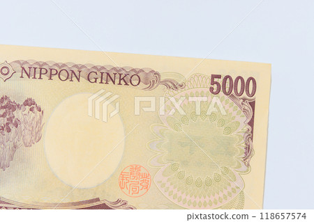 At Japan, Japanese yen currency banknotes are issued by Nippon Ginko Japan National Bank in denominations of five thousand yen back view At Japan, Japanese yen currency banknotes are issued by Nippon Ginko Japan National Bank in denominations of five thousand yen back view 118657574