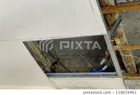 Ceiling restoration with exposed wiring 118659461