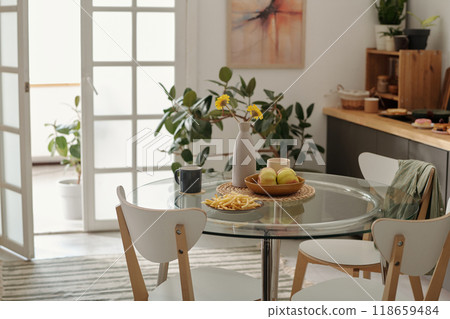 Table with junk food, vase and fruits 118659484