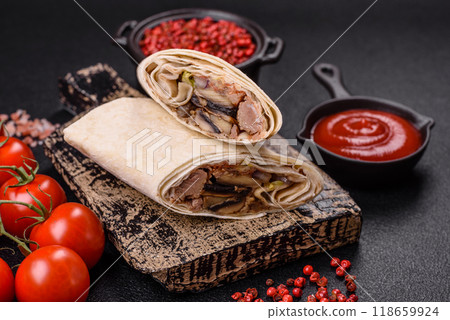 Delicious traditional shawarma or doner kebab with beef, mushrooms 118659924