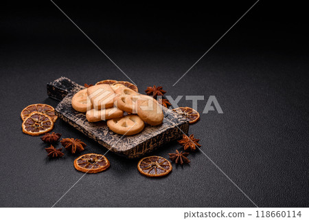 Delicious fresh sweet crispy butter cookies on a dark background 118660114
