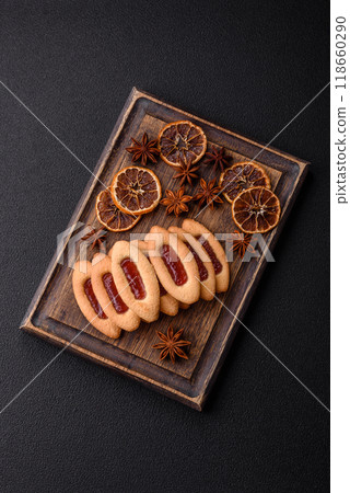 Delicious sweet crispy cookies with jam filling in the center 118660290