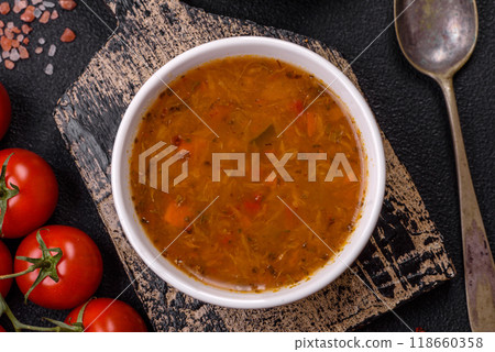 Delicious hot tomato soup with vegetables, vegan, vegetarian food Delicious hot tomato soup with vegetables, vegan, vegetarian food 118660358