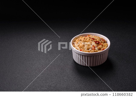 Delicious hot boiled wheat porridge couscous with vegetables Delicious hot boiled wheat porridge couscous with vegetables 118660382