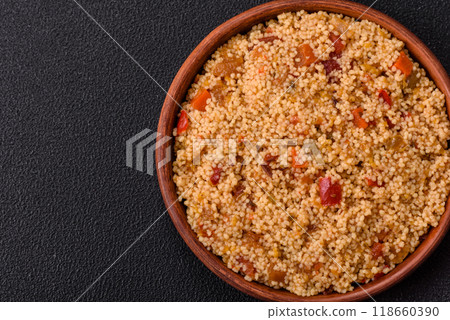 Delicious hot boiled wheat porridge couscous with vegetables Delicious hot boiled wheat porridge couscous with vegetables 118660390