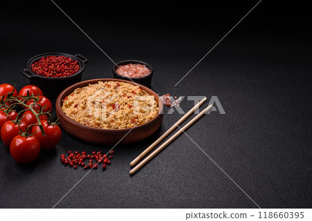 Delicious hot boiled wheat porridge couscous with vegetables 118660395