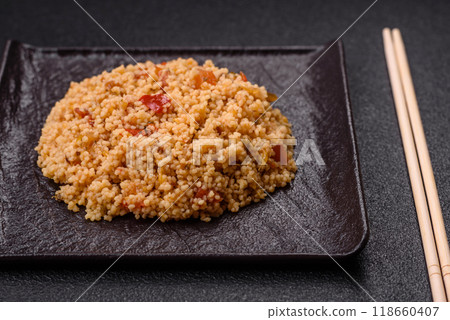 Delicious hot boiled wheat porridge couscous with vegetables Delicious hot boiled wheat porridge couscous with vegetables 118660407