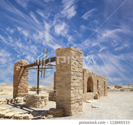 Quseir (Qasr) Amra desert castle (against the sky with clouds) near Amman, Jordan. World heritage with famous fresco's. Built in 8th century, of early Islamic art and architecture Quseir (Qasr) Amra desert castle (against the sky with clouds) near Amman, Jordan. World heritage with famous fresco's. Built in 8th century, of early Islamic art and architecture 118660533