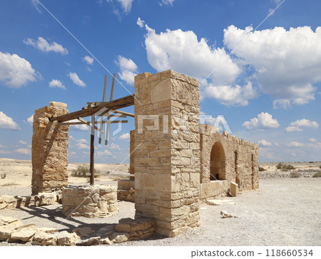 Quseir (Qasr) Amra desert castle (against the sky with clouds) near Amman, Jordan. World heritage with famous fresco's. Built in 8th century,  of early Islamic art and architecture 118660534