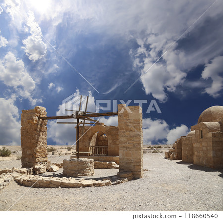 Quseir (Qasr) Amra desert castle (against the sky with clouds) near Amman, Jordan. World heritage with famous fresco's. Built in 8th century, of early Islamic art and architecture Quseir (Qasr) Amra desert castle (against the sky with clouds) near Amman, Jordan. World heritage with famous fresco's. Built in 8th century, of early Islamic art and architecture 118660540