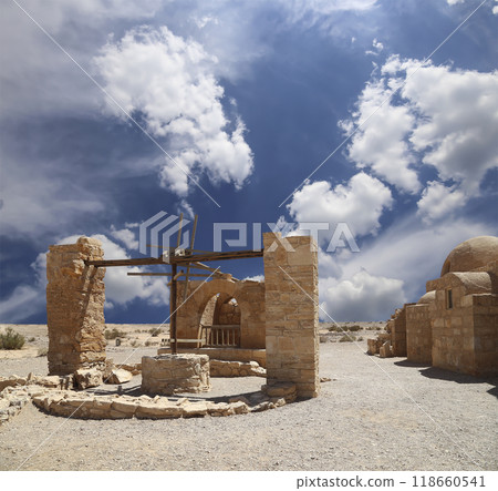 Quseir (Qasr) Amra desert castle (against the sky with clouds) near Amman, Jordan. World heritage with famous fresco's. Built in 8th century, of early Islamic art and architecture Quseir (Qasr) Amra desert castle (against the sky with clouds) near Amman, Jordan. World heritage with famous fresco's. Built in 8th century, of early Islamic art and architecture 118660541