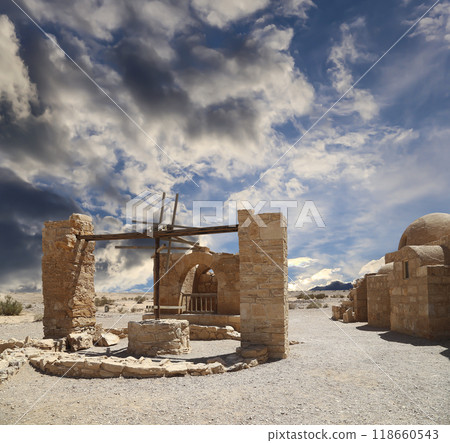 Quseir (Qasr) Amra desert castle (against the sky with clouds) near Amman, Jordan. World heritage with famous fresco's. Built in 8th century,  of early Islamic art and architecture 118660543