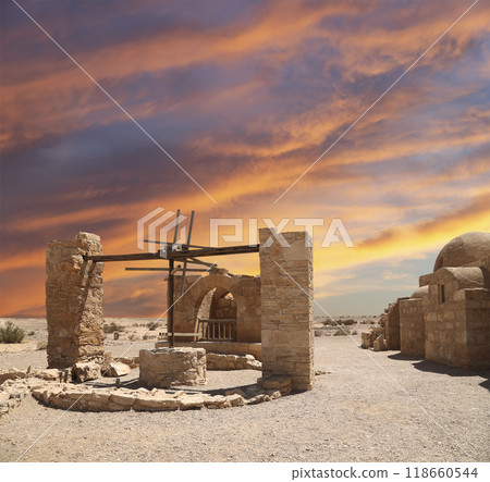 Quseir (Qasr) Amra desert castle (against the sky with clouds) near Amman, Jordan. World heritage with famous fresco's. Built in 8th century, of early Islamic art and architecture Quseir (Qasr) Amra desert castle (against the sky with clouds) near Amman, Jordan. World heritage with famous fresco's. Built in 8th century, of early Islamic art and architecture 118660544