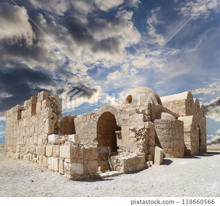 Quseir (Qasr) Amra desert castle (against the sky with clouds) near Amman, Jordan. World heritage with famous fresco's. Built in 8th century,  of early Islamic art and architecture 118660566