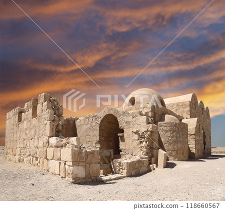 Quseir (Qasr) Amra desert castle (against the sky with clouds) near Amman, Jordan. World heritage with famous fresco's. Built in 8th century,  of early Islamic art and architecture 118660567