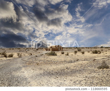 Quseir (Qasr) Amra desert castle (against the sky with clouds) near Amman, Jordan. World heritage with famous fresco's. Built in 8th century,  of early Islamic art and architecture 118660595