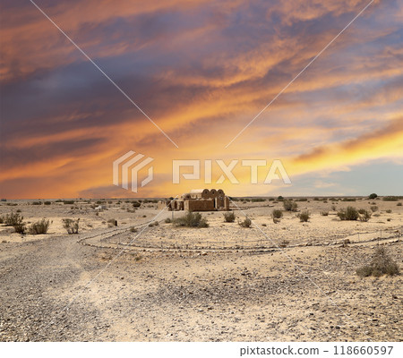 Quseir (Qasr) Amra desert castle (against the sky with clouds) near Amman, Jordan. World heritage with famous fresco's. Built in 8th century, of early Islamic art and architecture Quseir (Qasr) Amra desert castle (against the sky with clouds) near Amman, Jordan. World heritage with famous fresco's. Built in 8th century, of early Islamic art and architecture 118660597