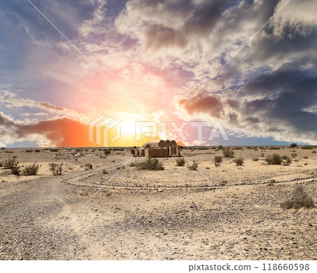Quseir (Qasr) Amra desert castle (against the sky with clouds) near Amman, Jordan. World heritage with famous fresco's. Built in 8th century,  of early Islamic art and architecture 118660598
