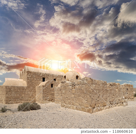 Quseir (Qasr) Amra desert castle (against the sky with clouds) near Amman, Jordan. World heritage with famous fresco's. Built in 8th century, of early Islamic art and architecture Quseir (Qasr) Amra desert castle (against the sky with clouds) near Amman, Jordan. World heritage with famous fresco's. Built in 8th century, of early Islamic art and architecture 118660610