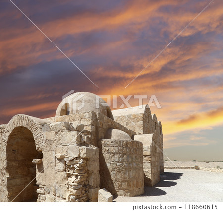 Quseir (Qasr) Amra desert castle (against the sky with clouds) near Amman, Jordan. World heritage with famous fresco's. Built in 8th century,  of early Islamic art and architecture 118660615