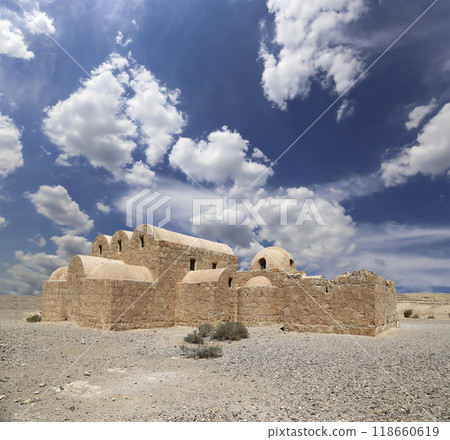 Quseir (Qasr) Amra desert castle (against the sky with clouds) near Amman, Jordan. World heritage with famous fresco's. Built in 8th century, of early Islamic art and architecture Quseir (Qasr) Amra desert castle (against the sky with clouds) near Amman, Jordan. World heritage with famous fresco's. Built in 8th century, of early Islamic art and architecture 118660619