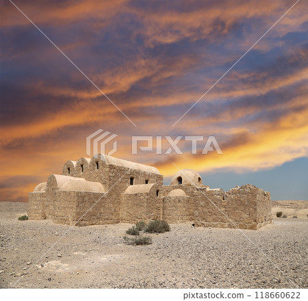 Quseir (Qasr) Amra desert castle (against the sky with clouds) near Amman, Jordan. World heritage with famous fresco's. Built in 8th century, of early Islamic art and architecture Quseir (Qasr) Amra desert castle (against the sky with clouds) near Amman, Jordan. World heritage with famous fresco's. Built in 8th century, of early Islamic art and architecture 118660622