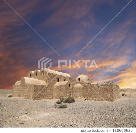 Quseir (Qasr) Amra desert castle (against the sky with clouds) near Amman, Jordan. World heritage with famous fresco's. Built in 8th century, of early Islamic art and architecture Quseir (Qasr) Amra desert castle (against the sky with clouds) near Amman, Jordan. World heritage with famous fresco's. Built in 8th century, of early Islamic art and architecture 118660623