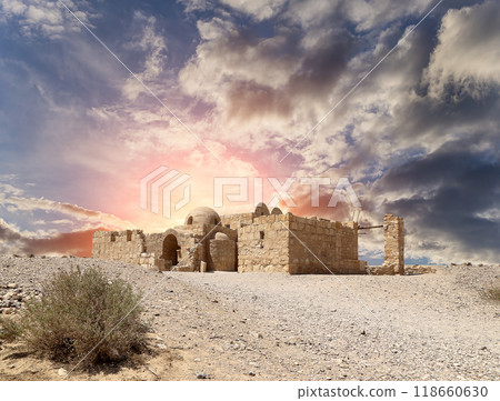 Quseir (Qasr) Amra desert castle (against the sky with clouds) near Amman, Jordan. World heritage with famous fresco's. Built in 8th century,  of early Islamic art and architecture 118660630