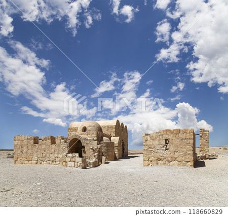 Quseir (Qasr) Amra desert castle (against the sky with clouds) near Amman, Jordan. World heritage with famous fresco's. Built in 8th century, of early Islamic art and architecture Quseir (Qasr) Amra desert castle (against the sky with clouds) near Amman, Jordan. World heritage with famous fresco's. Built in 8th century, of early Islamic art and architecture 118660829