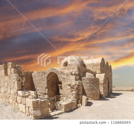 Quseir (Qasr) Amra desert castle (against the sky with clouds) near Amman, Jordan. World heritage with famous fresco's. Built in 8th century,  of early Islamic art and architecture 118660845