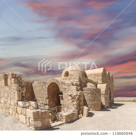 Quseir (Qasr) Amra desert castle (against the sky with clouds) near Amman, Jordan. World heritage with famous fresco's. Built in 8th century,  of early Islamic art and architecture 118660846