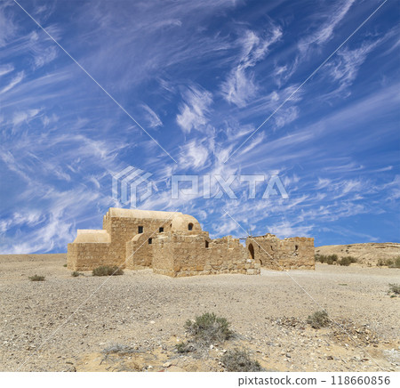 Quseir (Qasr) Amra desert castle (against the sky with clouds) near Amman, Jordan. World heritage with famous fresco's. Built in 8th century,  of early Islamic art and architecture 118660856