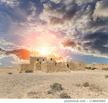 Quseir (Qasr) Amra desert castle (against the sky with clouds) near Amman, Jordan. World heritage with famous fresco's. Built in 8th century, of early Islamic art and architecture Quseir (Qasr) Amra desert castle (against the sky with clouds) near Amman, Jordan. World heritage with famous fresco's. Built in 8th century, of early Islamic art and architecture 118660860