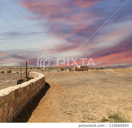 Quseir (Qasr) Amra desert castle (against the sky with clouds) near Amman, Jordan. World heritage with famous fresco's. Built in 8th century,  of early Islamic art and architecture 118660865