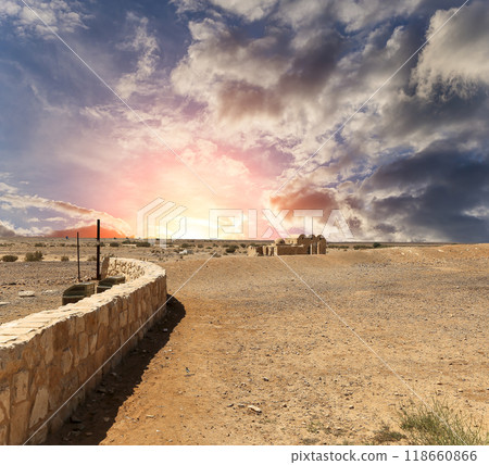 Quseir (Qasr) Amra desert castle (against the sky with clouds) near Amman, Jordan. World heritage with famous fresco's. Built in 8th century,  of early Islamic art and architecture 118660866