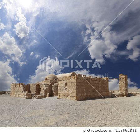 Quseir (Qasr) Amra desert castle (against the sky with clouds) near Amman, Jordan. World heritage with famous fresco's. Built in 8th century,  of early Islamic art and architecture 118660881