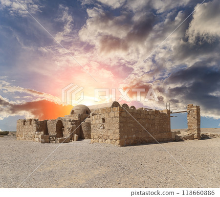 Quseir (Qasr) Amra desert castle (against the sky with clouds) near Amman, Jordan. World heritage with famous fresco's. Built in 8th century, of early Islamic art and architecture Quseir (Qasr) Amra desert castle (against the sky with clouds) near Amman, Jordan. World heritage with famous fresco's. Built in 8th century, of early Islamic art and architecture 118660886
