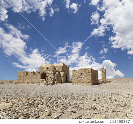 Quseir (Qasr) Amra desert castle (against the sky with clouds) near Amman, Jordan. World heritage with famous fresco's. Built in 8th century,  of early Islamic art and architecture 118660887