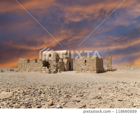 Quseir (Qasr) Amra desert castle (against the sky with clouds) near Amman, Jordan. World heritage with famous fresco's. Built in 8th century,  of early Islamic art and architecture 118660889